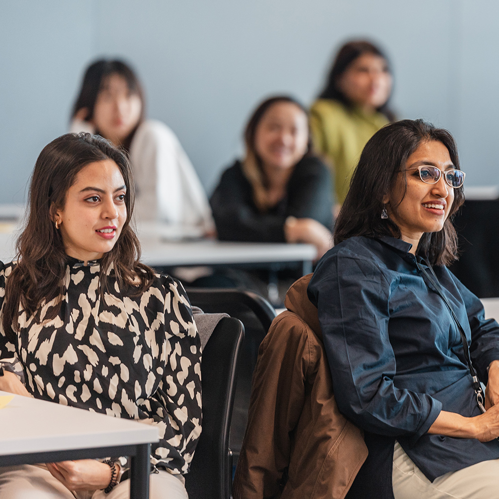 MBA students sitting at desks