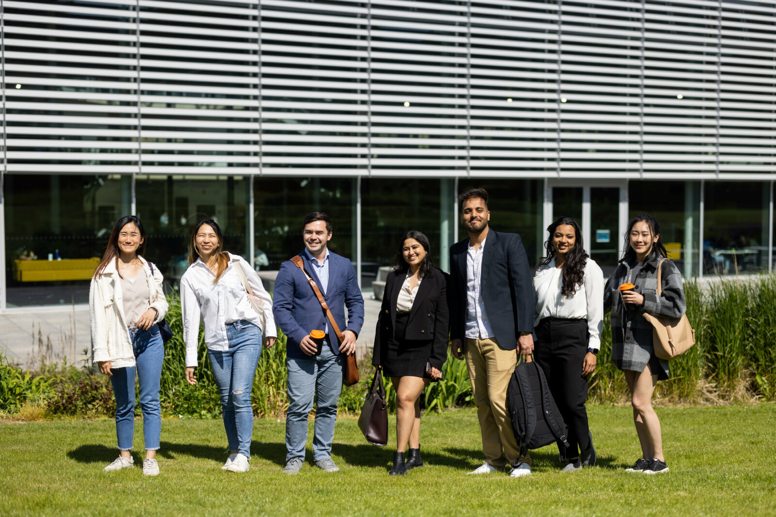 Bath MBA students standing outside the School of Management building